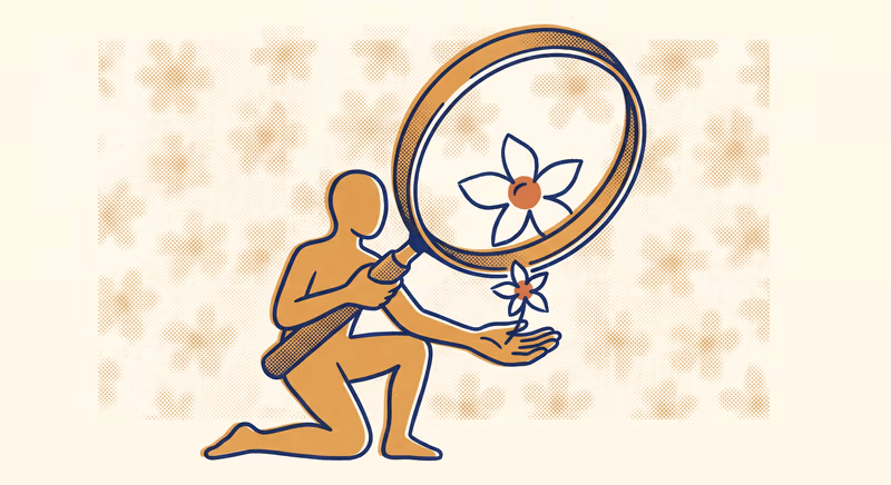 An ochre figure kneels on one knee holding an oversized magnifying glass, studying a small five-petal flower in their open palm against a halftone wallpaper of the same flower pattern — the inspector finding the one buyer in the wallpaper.